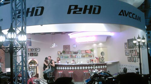 Panosonic builds a whole bar complete with hunk babes and motorcycles Panasonic builds a whole bar complete with hunk babes and motorcycles
